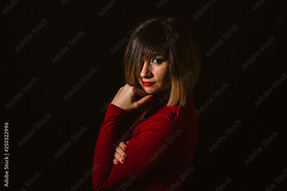 blonde woman posing on black background blonde woman posing on black background