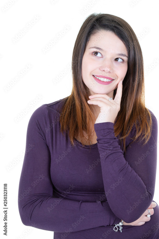 Happy pensive young woman thinking and looking up Happy pensive young woman thinking and looking up