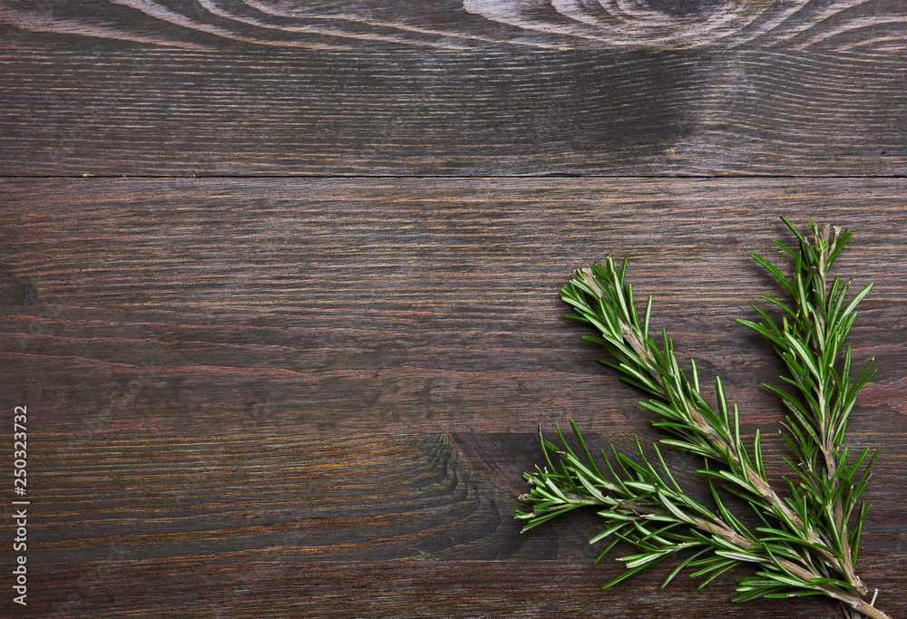 Fresh rosemary bound on a wood