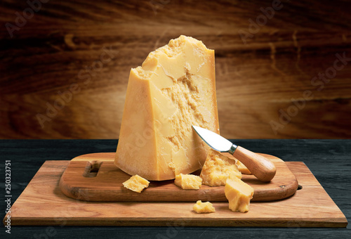 Parmesan cheese on wood photo