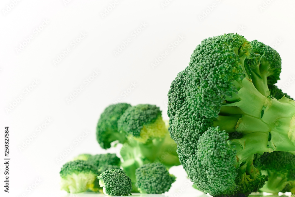 Raw broccoli isolated white background Raw broccoli isolated white background