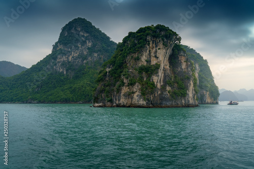 Ha Long Bay Vietnam. Famous travel nature destination. Green mountains in the water. Islands landscape at Halong