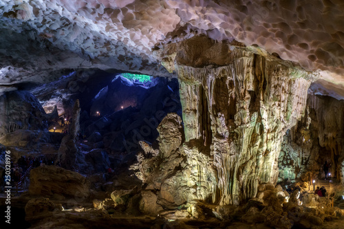 Cave deep dark inside near entrance. Underground of stone rock mountain. Ha Long Vietnam nature background