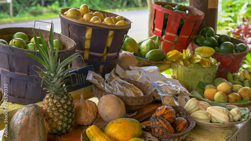 close up of fresh tropical fruit for sale at a roadside stand on the road to hana photo