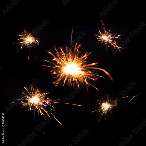 Set of different sparklers. Bengal fire on black background