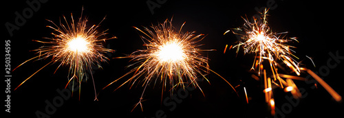 Set of different sparklers. Bengal fire on black background