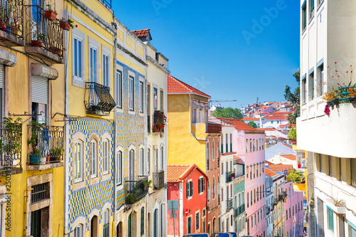 Colorful buildings of Lisbon historic center near landmark Rossio Square photo
