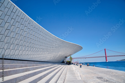 Lisbon, Portugal-October 17, 2017: Famous MAAT Museum in Lisbon near river Tagus and Landmark 25 of April bridge photo