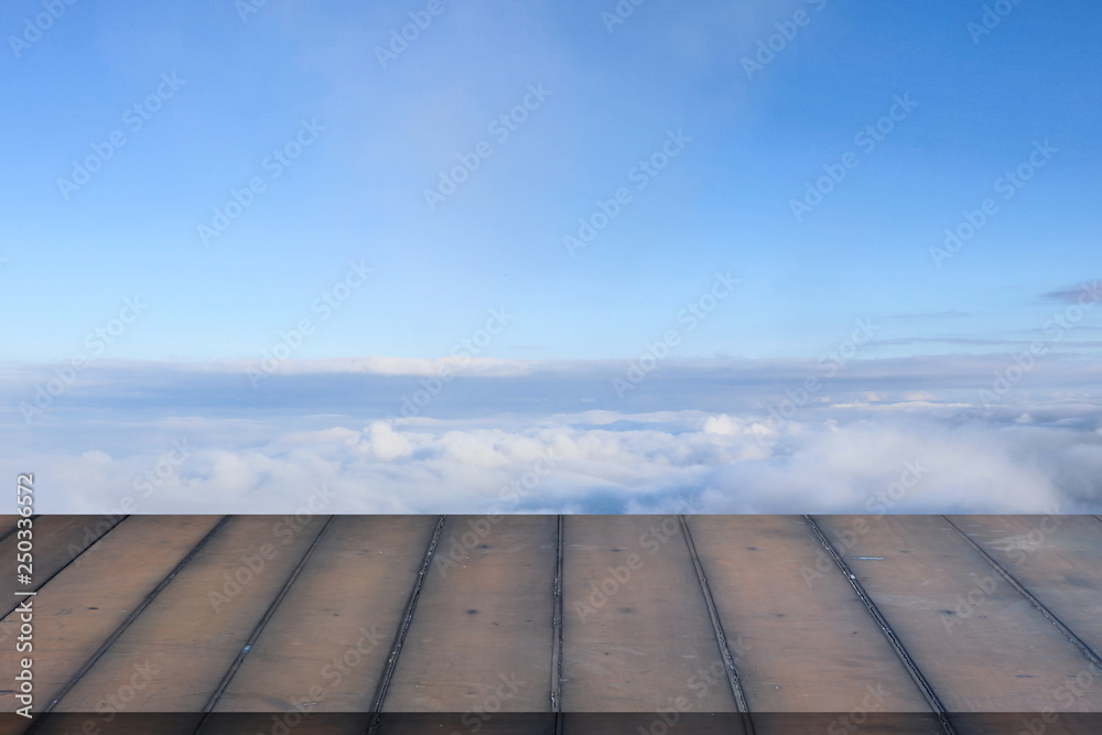 Wood background. Old wood and blue sky. Empty wood  floor against with the blue sky clouds.