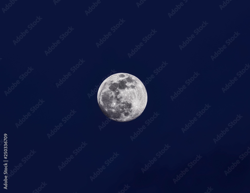 supermoon on background of blue sky, at dusk.high resolution photography