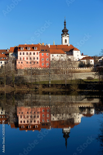 Sunny winter royal medieval Town Pisek with the Castle above the river Otava, Czech Republic 