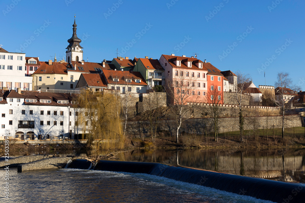 Obraz premium Sunny winter royal medieval Town Pisek with the Castle above the river Otava, Czech Republic 