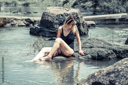 young woman in water