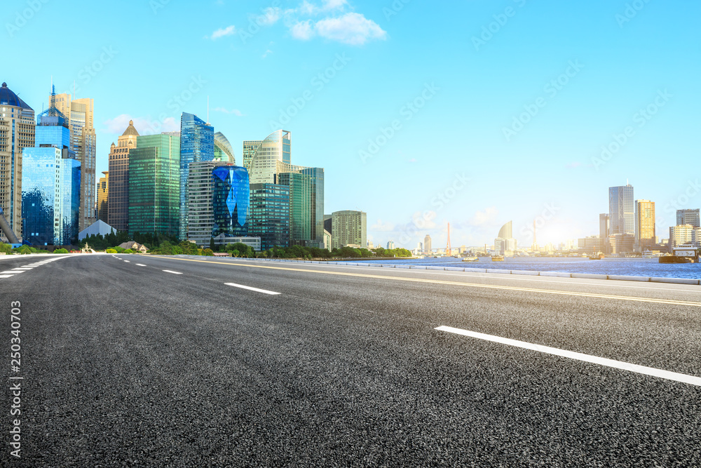 Asphalt road passes through Shanghai Lujiazui Financial District