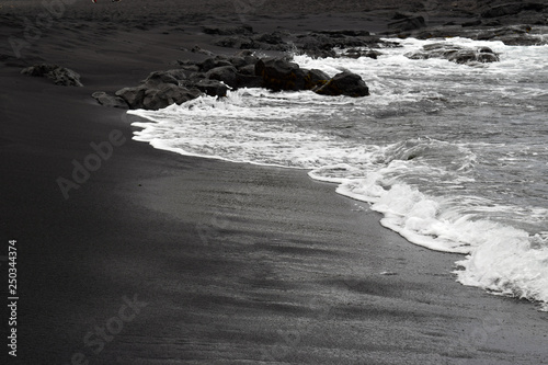 white wave on black sand, Big Island,Hawaii