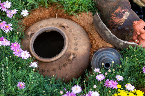 Garden decoration idea, Thai style landscape design idea, design clay pot in flower garden