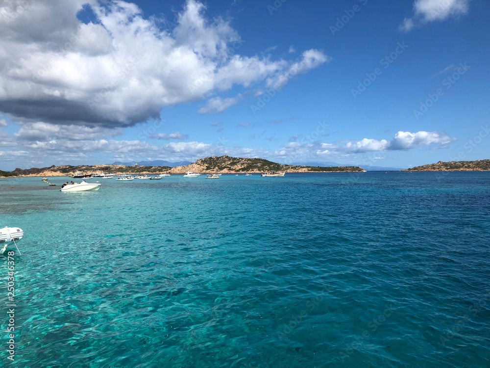Island in clear blue water