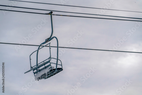 Chair lift with snow and icicles in Park City Utah