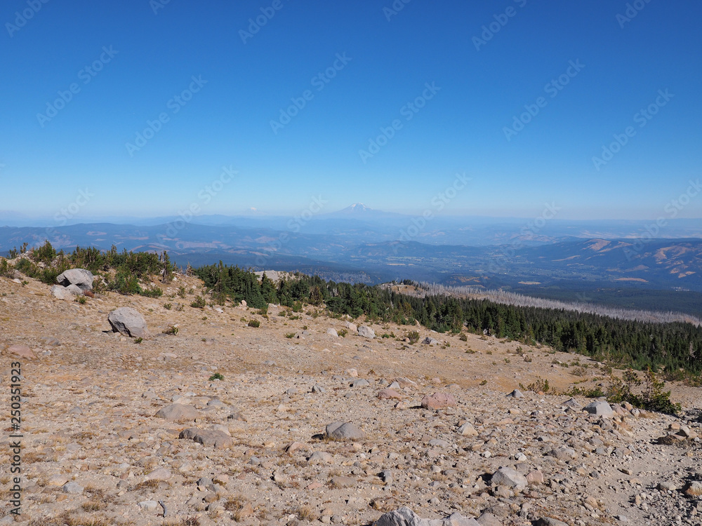 Distant views of Mount Jefferson and Mount Rainier on an exceptionally clear day from the Timberline Trail on Mount Hood, Oregon.