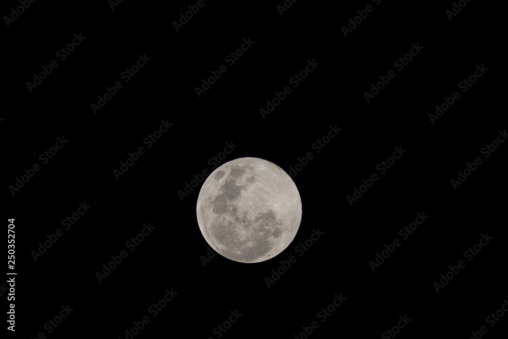 Super snow full moon in the dark night
