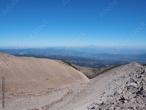 Distant views of Mount Jefferson and Mount Rainier on an exceptionally clear day from the Timberline Trail on Mount Hood, Oregon.