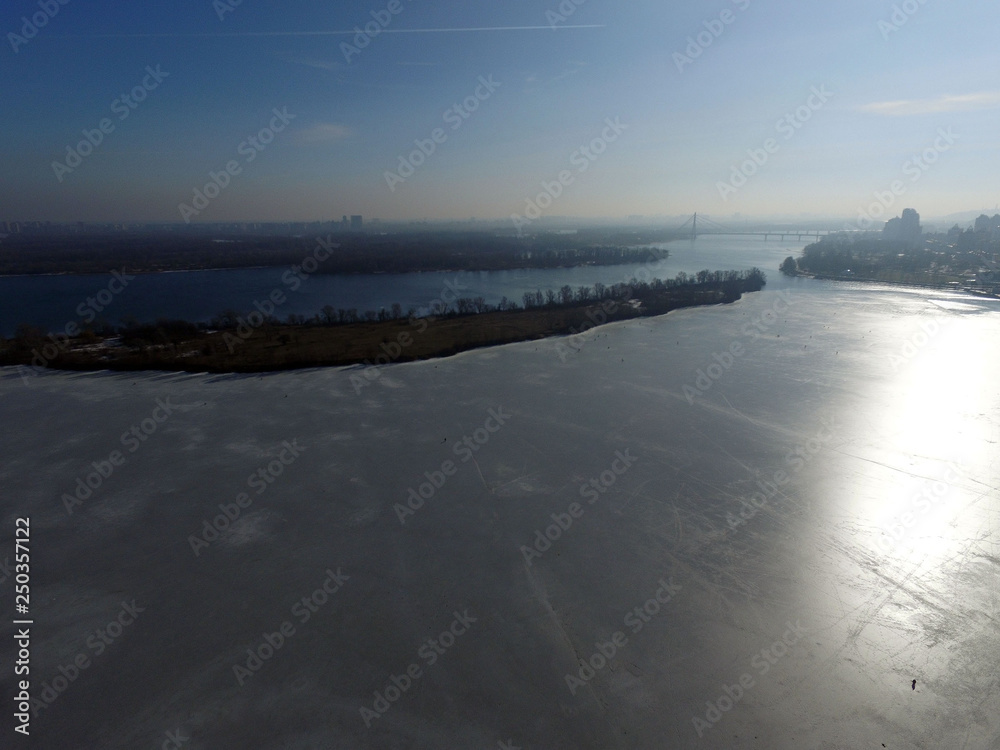 Aerial view of the Dnepr river in Kiev at winter (drone image). Kiev,Ukraine