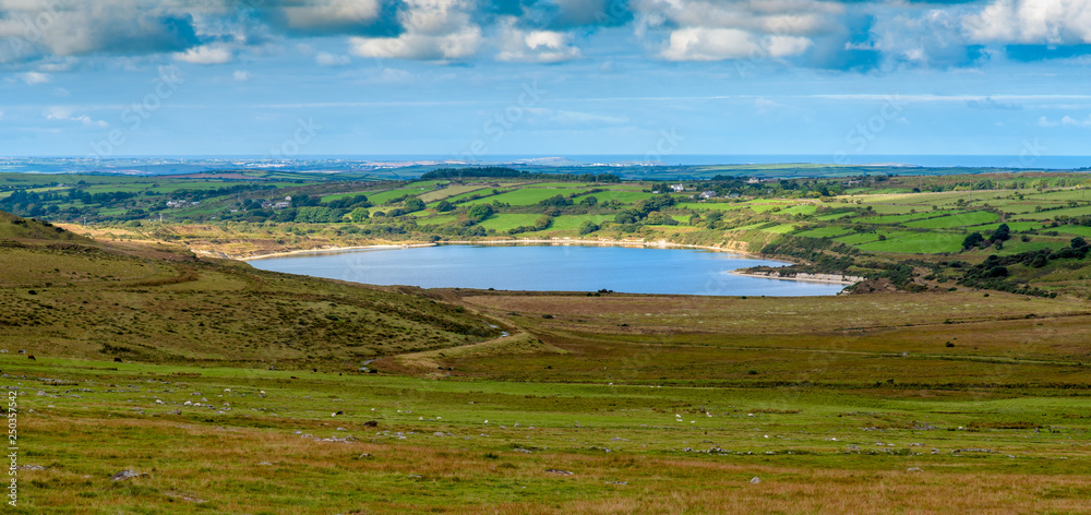 The Stannon Lake on Bodmin Moor in Cornwall was creeated by the flooding of a decommissioned china clay extraction quarry Pit and is now used as raw water resurce.