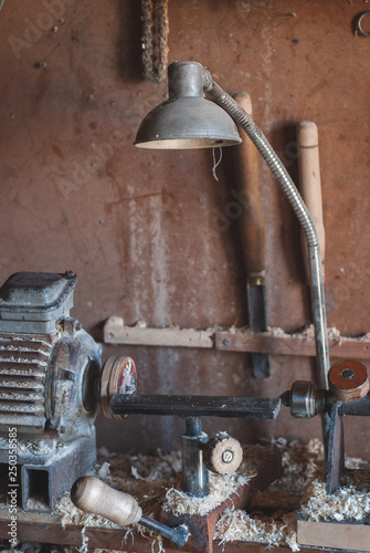 lathe  woodworker s workplace  old vintage sawdust machine around