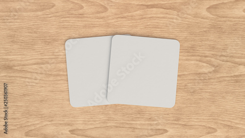 Mockup of blank white square beer coasters