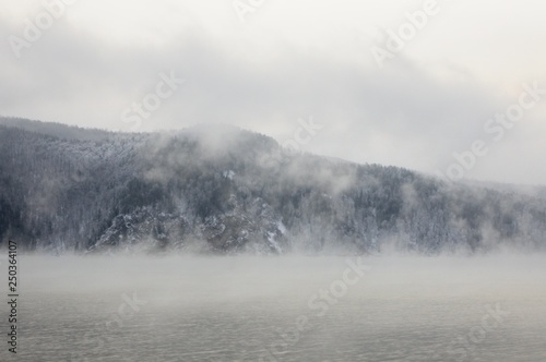 Foggy morning on the Yenisei river in winter near Krasnoyarsk in Siberia, Russia