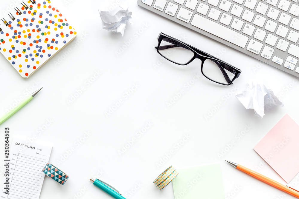 Education concept. Work desk of student. Computer keyboard and stationery on white background top view space for text Education concept. Work desk of student. Computer keyboard and stationery on white background top view space for text