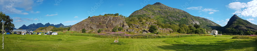 Grassy pasture in the Lofoten island Arsteinen Grassy pasture in the Lofoten island Arsteinen