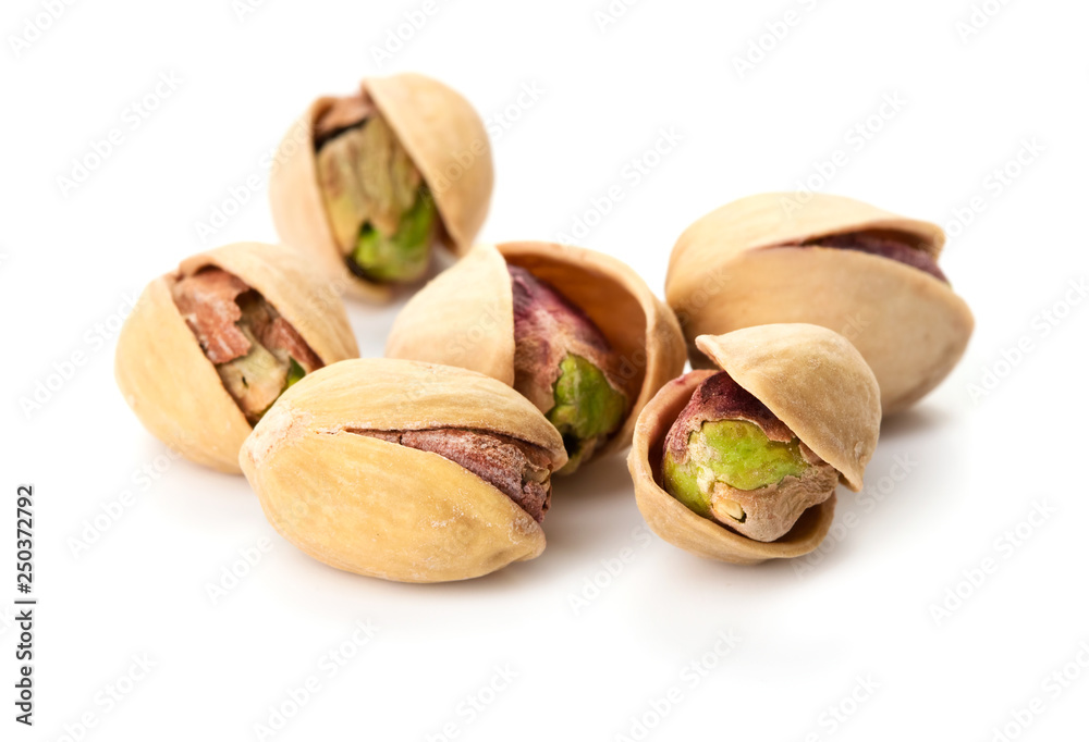 heap of pistachio isolated on white background heap of pistachio isolated on white background