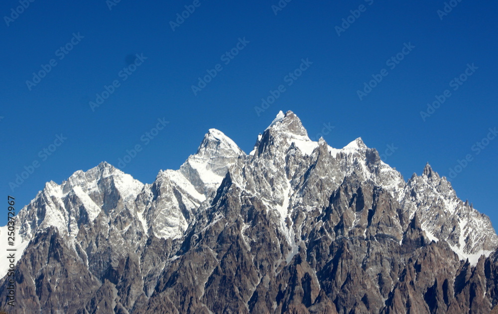 Spectacular mountain scenery. Snow Mountain with Blue Sky,