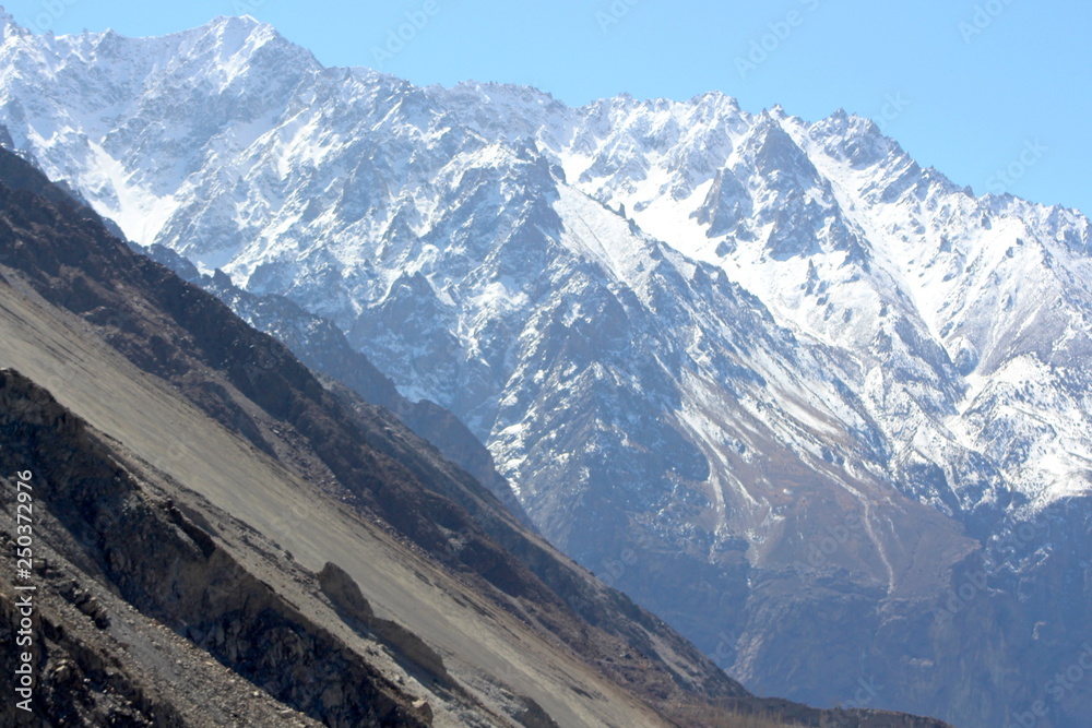 Spectacular mountain scenery. Snow Mountain with Blue Sky,