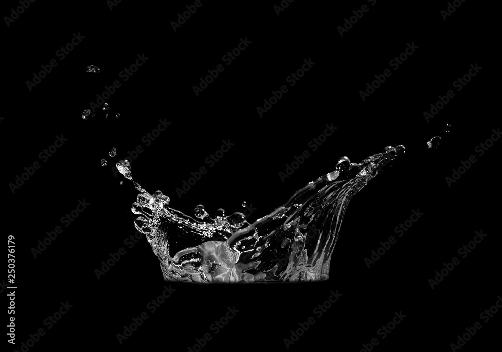 close up of water splash and bubbles isolated on black background close up of water splash and bubbles isolated on black background