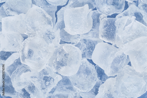 Frozen ice cubes for cocktails. Background with ice cubes