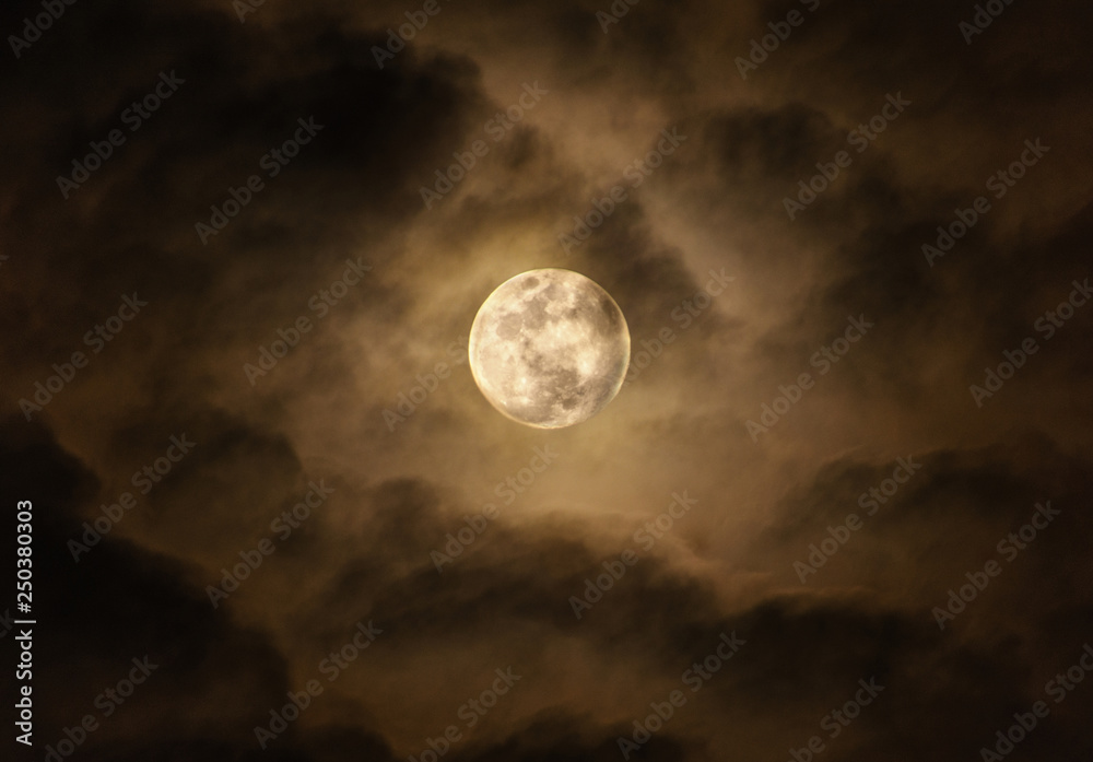 bright super moon at night sky with cloudy and copy space