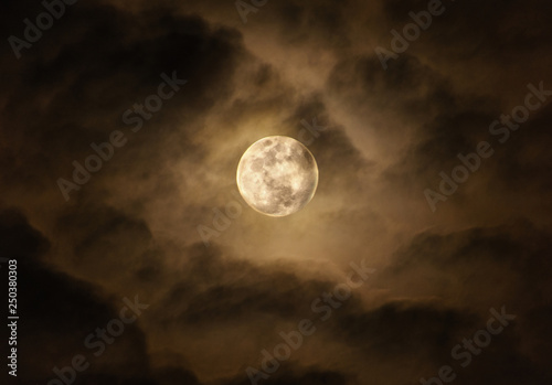 bright super moon at night sky with cloudy and copy space