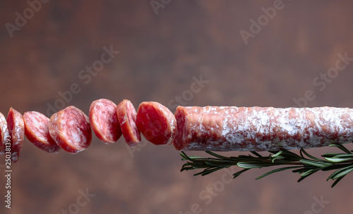 Smoked salami with rosemary .