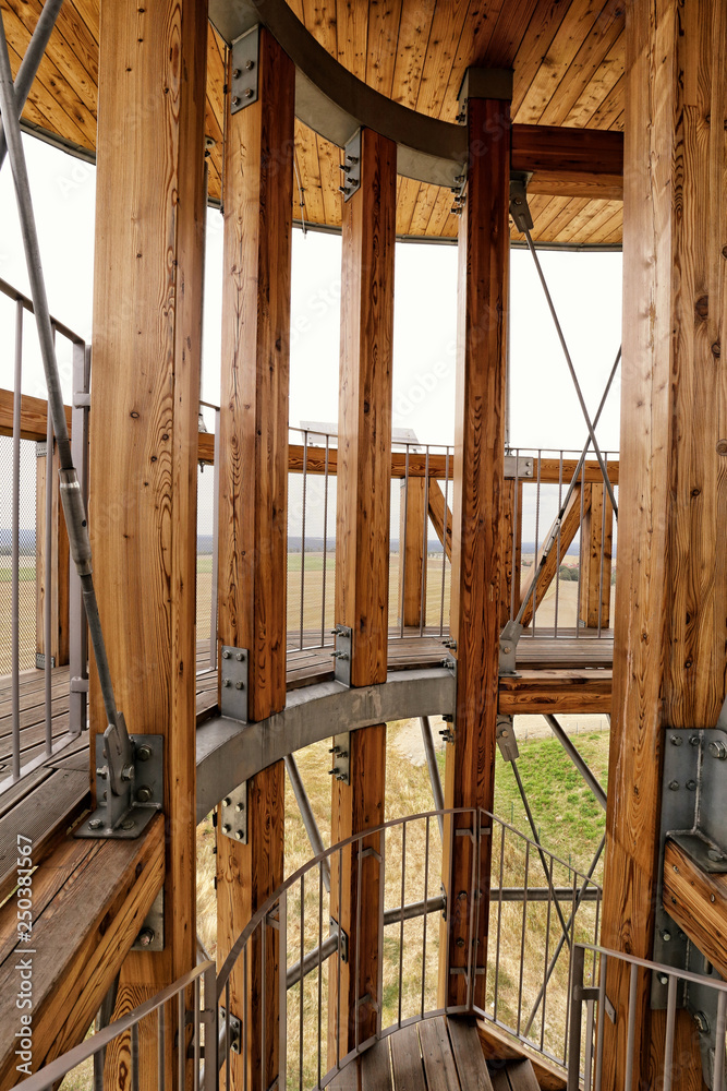 Wooden poles and metal banisters of the modern outlook tower