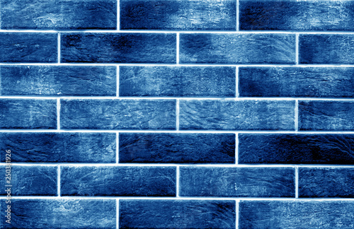 Decorative brick wall in navy blue color.