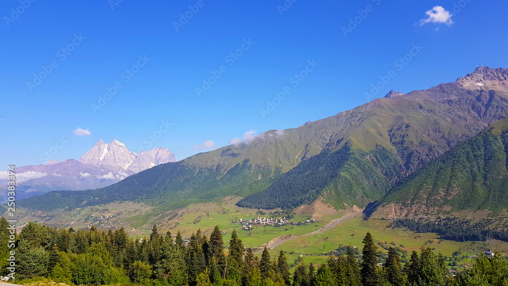 The landscape of Svaneti in Georgia with on the left, the Ushba mountain (4,710 m), one of the most notable peaks of the Caucasus Mountains
