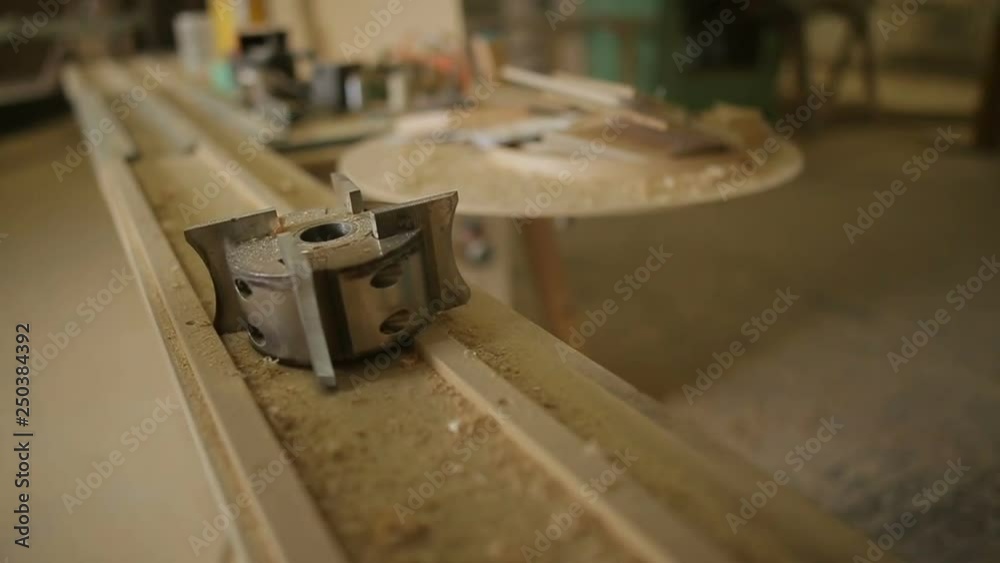focus on drill for working or processing wooden parts and details in workshop