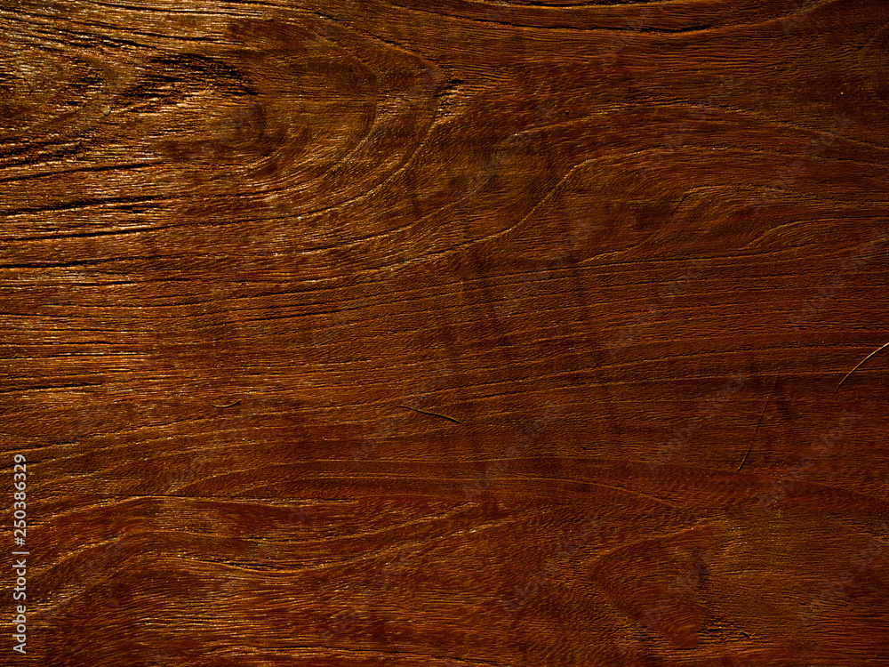 Empty wooden table background texture with sunlight on surface, top view