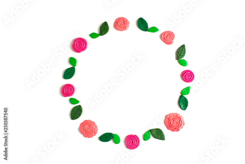 wreath of flowers and leaves on a white background