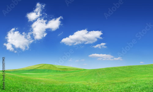 Idyllic view, green hills and blue sky © Trutta