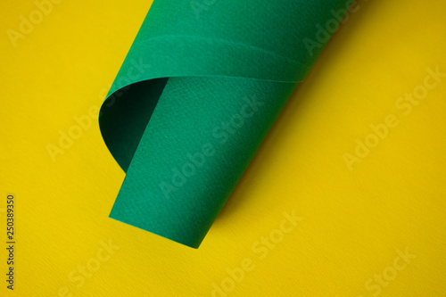 Textured green and yellow design paper.