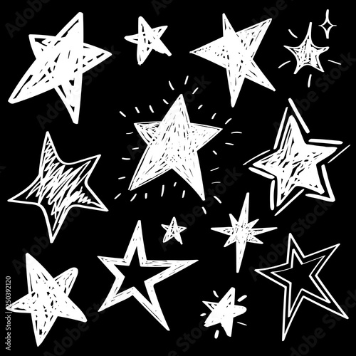 Set of white hand drawn vector stars in doodle style isolated on black background. Could be used as pattern element, cards, childish design