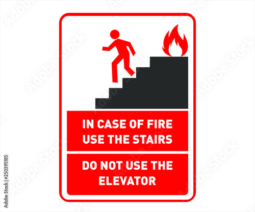 A Fire Safety Sign/Poster Advising People to Use the Stairs and not the Elevator; Emergency response and survival advice - Office Safety